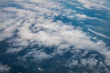 View from airplane at clouds.