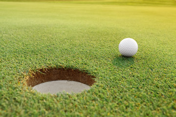 Golf ball on the green course