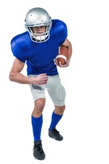 Portrait American football player holding ball