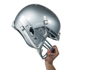 Fototapeta premium American football player handing his sliver helmet