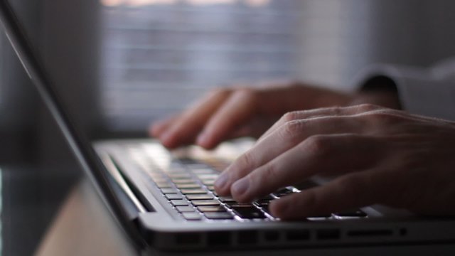 working on laptop at night