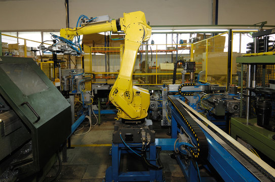 robot working in the metal industry, color image,