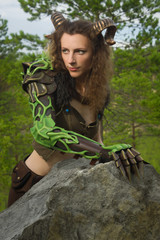 Pretty female faun in a wood
