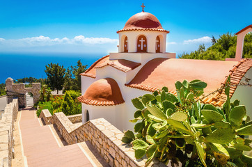 Typical Greek church with red roof, Greece