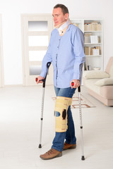 Man with leg in knee cages