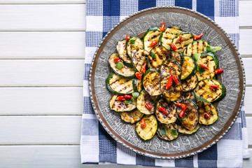 Zucchini.  Grilled zucchini. Slices of grilled zucchini on a plate. Vegetarian - Mediterranean cuisine. 
