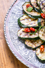 Zucchini.  Grilled zucchini. Slices of grilled zucchini on a plate. Vegetarian - Mediterranean cuisine. 