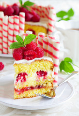 Waffle cake with raspberries and cream.