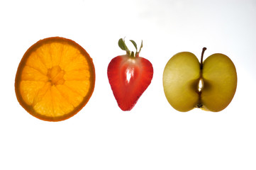 various sectioned and white fruit,apple, orange,strawberry,
