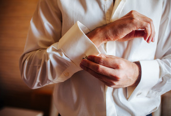 Groom prepares for wedding