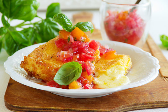 Fried brie with tomato salsa.