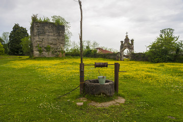 old well with iron bucket