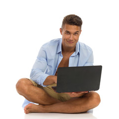 Cheerful Handsome Man With Laptop
