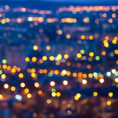 Fototapeta na wymiar abstract circular bokeh city lights with horizon colorful backgr