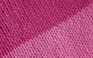Magenta and pink stockinette knitting background