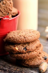 Tasty chocolate chip cookie and sour milk