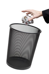 Hand Dropping Paper in Trash Bin Isolated on White