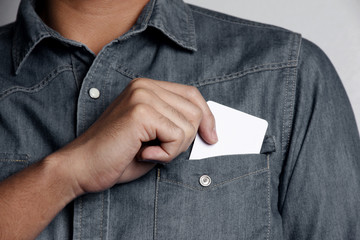 man holding a blank card
