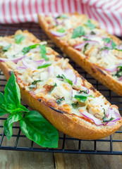 Barbecue chicken pizza baguette, selective focus