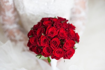bride holding flowers