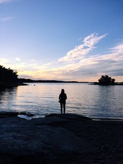 Girl looking at the sunset