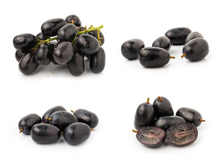 Black seedless grapes on white background