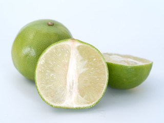 limes, a shrub in the family Rutaceae small sour fruit used for cooking.