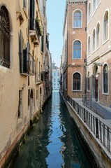 Fototapeta na wymiar Narrow channel in san Marco, Venice, Italy