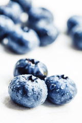 Fresh ripe blueberries on white background, selective focus