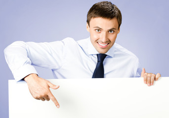 Business man showing blank signboard, over violet