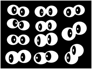 Vector cartoon eyes set isolated on black background