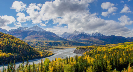 Fototapeta premium The Matanuska River flows below the Chugach Mountains in Alaska