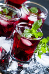 Pomegranate drink with mint and ice, selective focus