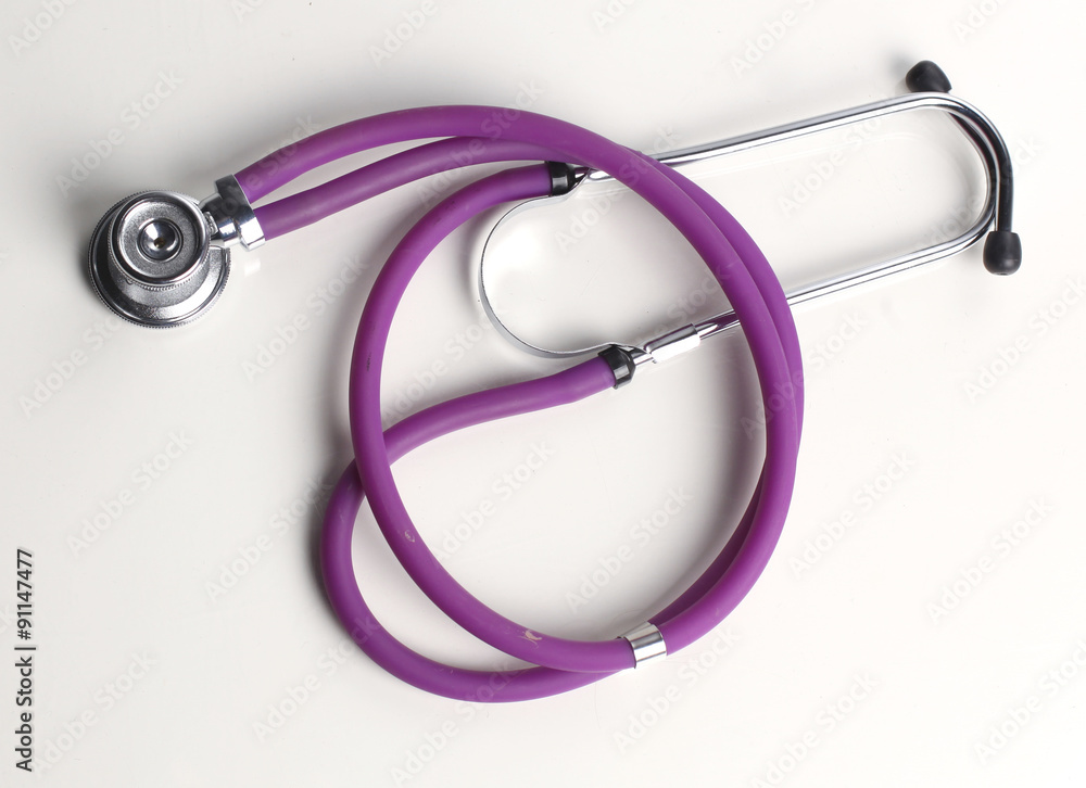 Wall mural close up medical stethoscope on a white background