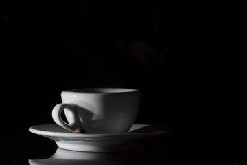small white cup of Italian coffee