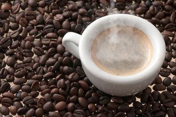 cup of coffee with beans
