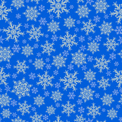 Seamless pattern of snowflakes, white on blue