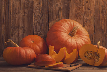 pumpkins on wooden board