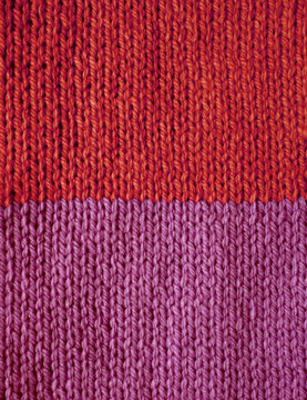 Red and purple striped stocking stitch knitting