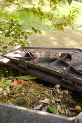 Small outdoor composting bin for recycling kitchen and garden organic waste