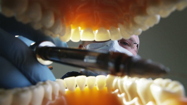 view from inside an open mouth getting a shot of novocaine