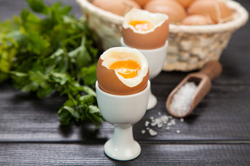 Boiled eggs on dark background