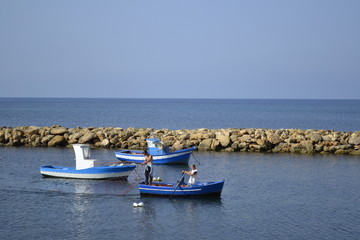Obraz premium pescatori al lavoro