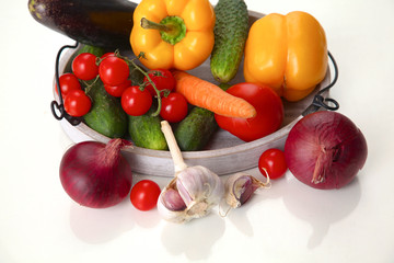 Fresh autumn vegetables on a white background