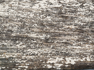 Morsches altes Holz mit abblätternder weißer Farbe als Hintergrund