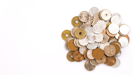 Japanese Yen coins over white background
