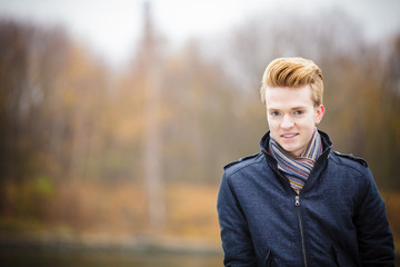 Portrait of young stylish fashionable man in jacket.