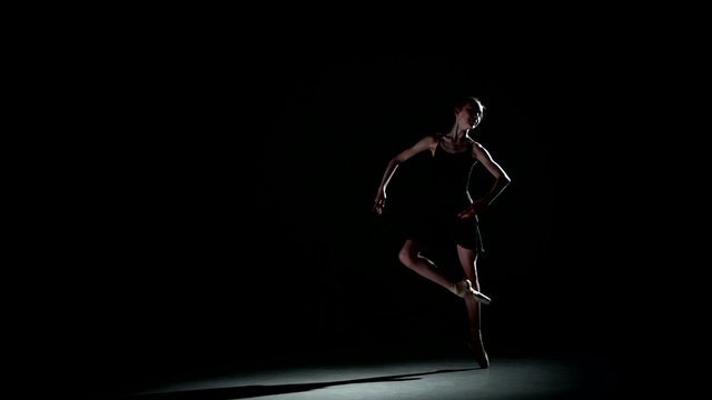  ballet dancer isolated on black background