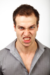 Angry upset man with scary face