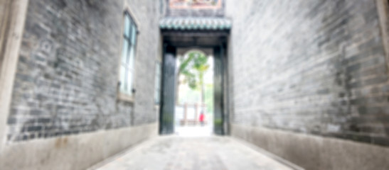 Fototapeta na wymiar Blur background, Old alley build with stone